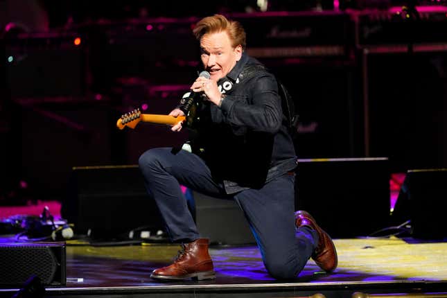 Conan O&#39;Brien performs at the 8th annual Love Rocks NYC concert benefiting God&#39;s Love We Deliver at the Beacon Theatre, Thursday, March 7, 2024, in New York. (Photo by Charles Sykes/Invision/AP)