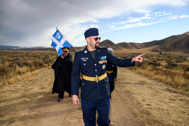 Grand Duke Travis McHenry leads his Westarctican Royal Guard and King Timothy Miller of Shiloh, visible on the left, on a bloodless invasion and annexation of the micronation of Calsahara on Oct. 29, 2017. Travis McHenry led both Westarctica and Calsahara at different points in his life, and the annexation merges both countries.