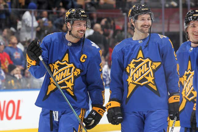 TORONTO, ONTARIO - FEBRUARY 03: Auston Matthews #34 of the Toronto Maple Leafs celebrates with Filip Forsberg #9 of the Nashville Predators during the game between Team Matthews and Team McDavid during the 2024 Honda NHL All-Star Game on February 03, 2024 in Toronto, Ontario. (Photo by Claus Andersen/Getty Images)