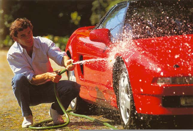 Ayrton Senna washing his Honda NSX