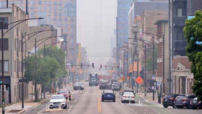 A photo of a city filled with wildfire smoke. 