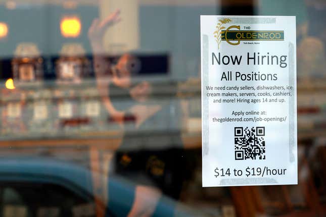 FILE - A sign advertises for help The Goldenrod, a popular restaurant and candy shop, Wednesday, June 1, 2022, in York Beach, Maine. Workers in several New England states are looking forward to a bump up in the minimum wage in 2024 . (AP Photo/Robert F. Bukaty, File)