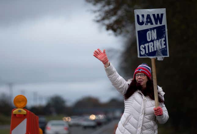 General Motors&#39; Spring Hill union employee Mary Beth Gervais walks the picket line near the plant in Spring Hill, Tenn., Monday, Oct. 30, 2023. Gervais has worked for 37 years for GM and is walking the line for the future workers. The union and GM have reached a tentative agreement on their contracts, but will remain on the picket line until the union bosses tell them otherwise. (Denny Simmons/The Tennessean via AP)