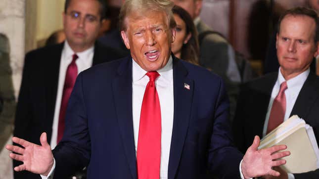 Former President Donald Trump speaks as the court takes a lunch break during his civil fraud trial at New York State Supreme Court on October 17, 2023 in New York City.