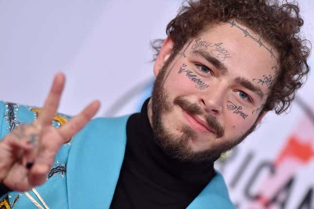 Post Malone poses for photos