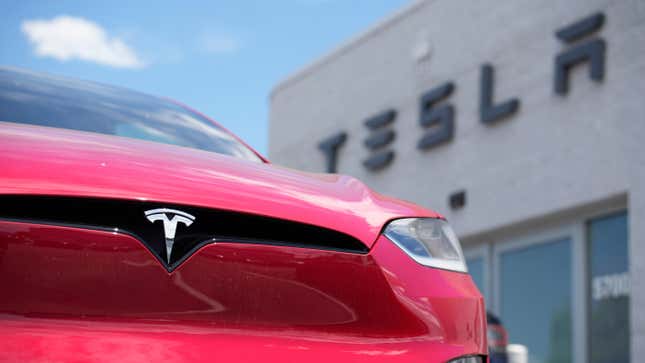 Unsold 2023 Model X sports-utility vehicle sits outside a Tesla dealership Sunday, June 18, 2023, in Littleton, Colo.