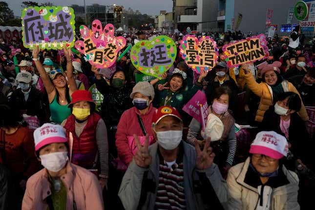 Supporters of the Democratic Progressive Party cheer at a rally in southern Taiwan&#39;s Tainan city on Friday, Jan. 12, 2024 ahead of the presidential election on Saturday. (AP Photo/Ng Han Guan)