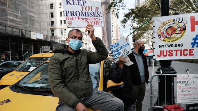  New York City taxi drivers and their supporters demanding debt relief rally during the second week of a hunger strike outside City Hall on October 31, 2021 in New York City.