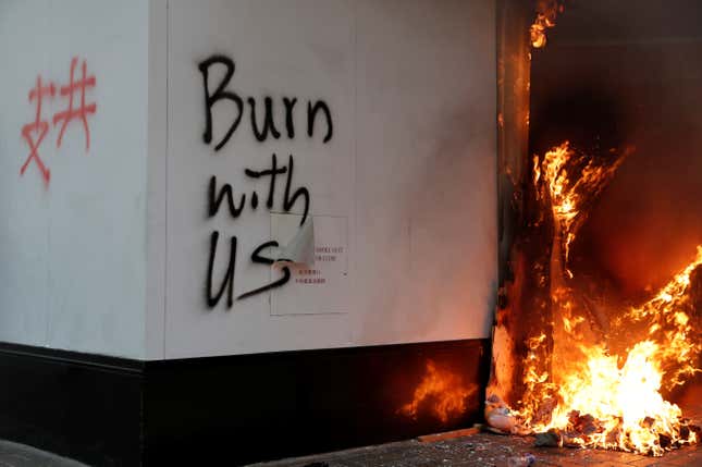 Graffiti is seen on the wall of a Bank of China branch during a demonstration in Central, Hong Kong, China November 11, 2019.