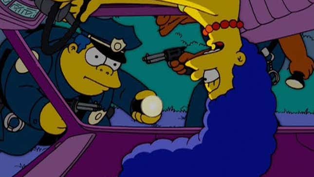 A screenshot from The Simpsons shows the police arresting a drunk Marge in her upside down car. 