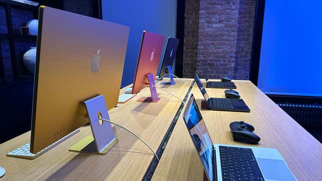 New M3-powered Apple iMacs and Macbooks on display. 