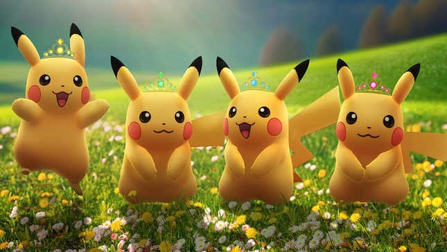 Pikachus stand in a field of flowers. 