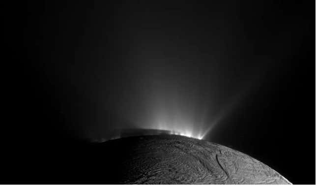 Gasses form beams of light on the surface of Enceladus, a moon of Saturn