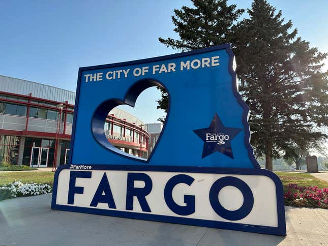 A sign outside of Fargo City Hall in Fargo, N.D., is seen Wednesday, Sept. 20, 2023. A state district court judge on Tuesday, Feb. 20, 2024, dismissed the city&#39;s lawsuit challenging a new state law that restricts cities and counties from regulating guns and ammunition by ordinances. The city filed the lawsuit last year, when the new law took effect. (AP Photo/Jack Dura)