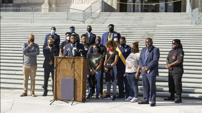 Attorney Lee Merritt speaks at a news conference along with the family of Ronald Greene and others, outside the Louisiana State Capitol in Baton Rouge, La. Body camera video obtained by The Associated Press shows Louisiana state troopers stunning, punching and dragging the Black man as he apologizes for leading them on a high-speed chase — footage authorities refused to release in the two years since the man died in police custody.