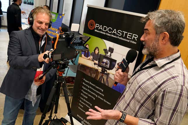 PADCASTER President Jon Goldberg, left, and CEO Josh Apter, demonstrate their Padcaster Studio for remote and virtual learning, at EDTECHWEEK 2023, in New York, Tuesday, Oct. 3, 2023. As soon as the federal pandemic relief started arriving at America&#39;s schools, tech companies by the dozens wanted a chance to prove that their software or equipment was exactly what schools needed. (AP Photo/Richard Drew)