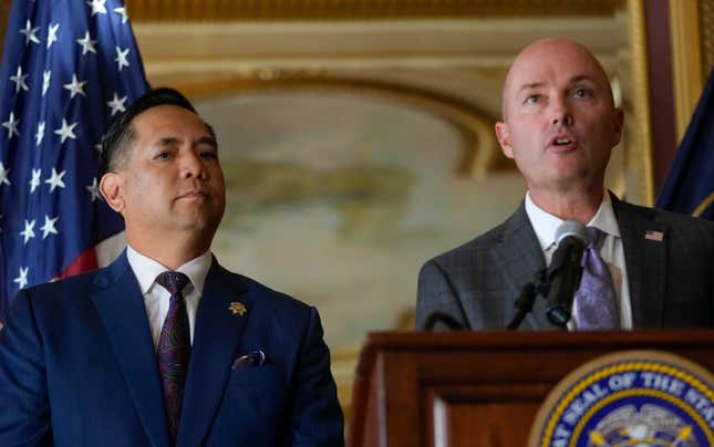 Utah Attorney General Sean Reyes listens as Gov. Spencer Cox speaks during a press conference following the announcement that Utah filed a lawsuit against TikTok at the Utah State Capitol in Salt Lake City, Utah on Tuesday, Oct. 10, 2023. (Bethany Baker/The Salt Lake Tribune via AP)