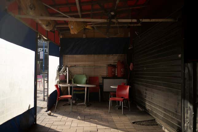 Tables and chairs at a restaurant that has closed due to Israel&#39;s war with Hamas in Sderot, Israel, Wednesday, Oct. 25, 2023. Israel&#39;s economy bounced back after previous wars with Hamas, but this round could last longer, possibly months, because the military&#39;s self-declared mission is to end Hamas rule, not just contain the militants. (AP Photo/Maya Alleruzzo)