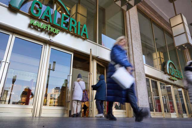 People enter and leave a branch of the department store Galeria Karstadt Kaufhof in Berlin, Germany, Tuesday, Jan. 9, 2024. Germany’s last remaining major department store chain has filed for insolvency protection, its third such application in less than four years, after its owner ran into difficulties. Galeria Karstadt Kaufhof, which currently runs 92 stores and employs more than 15,000 people, said Tuesday it filed for insolvency at a court in Essen. (Joerg Carstensen/dpa via AP)