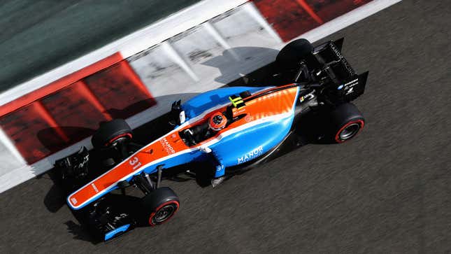 An aerial photo of the Manor F1 car racing in Abu Dhabi. 