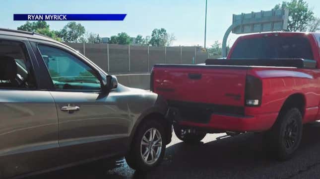 A Dodge Ram after a Hyundai SUV crashed into the rear bumper