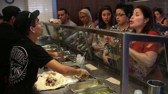 Long line of people ordering at Chipotle