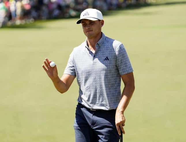 Apr 14, 2024; Augusta, Georgia, USA; Ludvig Aberg reacts after making a putt on No. 2 during the final round of the Masters Tournament.