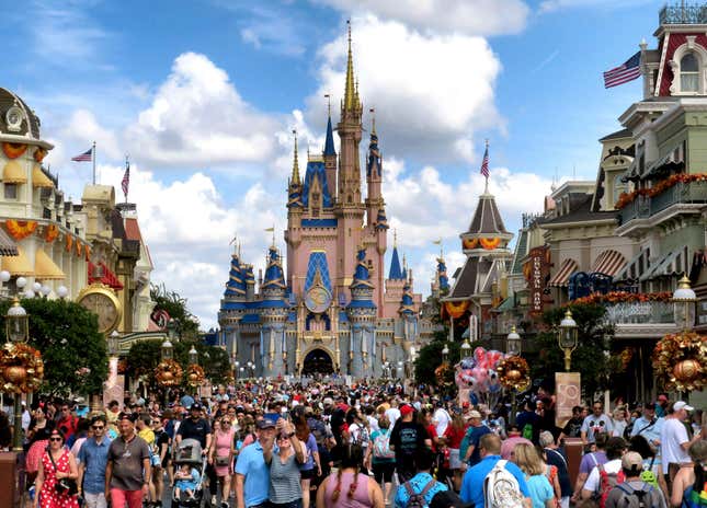 FILE - Crowds fill Main Street USA in front of Cinderella Castle at the Magic Kingdom on the 50th anniversary of Walt Disney World in Lake Buena Vista, Fla., on Oct. 1, 2021. Almost a year after Florida lawmakers passed a law giving Florida’s governor control over Walt Disney World’s governing district, Gov. Ron DeSantis on Thursday, Feb. 22, 2024, called the takeover a success, despite an exodus of workers, ongoing litigation and accusations of cronyism by the new leadership. (Joe Burbank/Orlando Sentinel via AP, File)/Orlando Sentinel via AP)