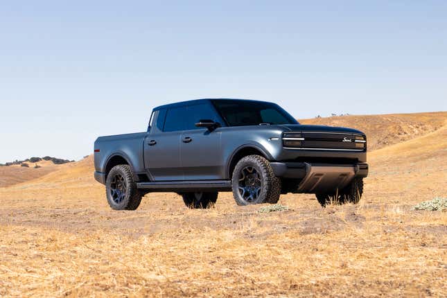 Front 3/4 view of a grey Scout Terra pickup