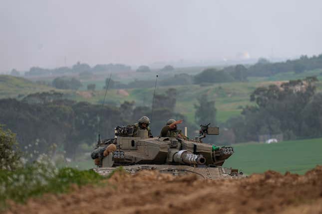 Israeli army tank moves near the Israeli-Gaza border, in southern Israel, Wednesday, Jan. 17, 2024.(AP Photo/Ohad Zwigenberg)