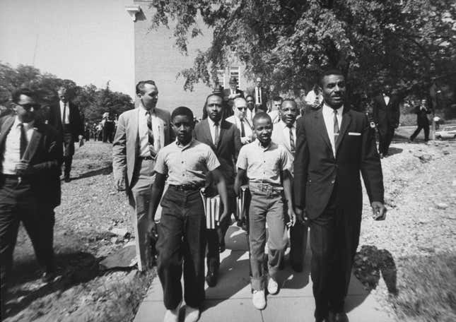 African-Amer. barber, James Armstrong, escorting sons, Dwight and Floyd, to all-white Graymont school, with the help of Rev. Fred L. Shutllesworth. 