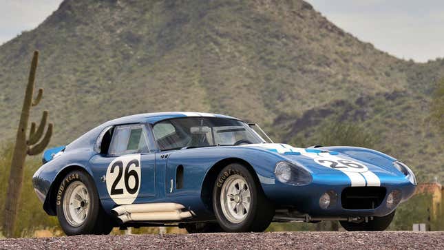 A photo of a vintage blue Shelby Daytona Type 65 sports car. 