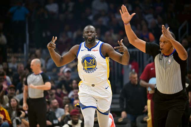  Draymond Green of the Golden State Warriors celebrates after scoring during the first quarter against the Cleveland Cavaliers at Rocket Mortgage Fieldhouse on November 05, 2023 in Cleveland, Ohio. 