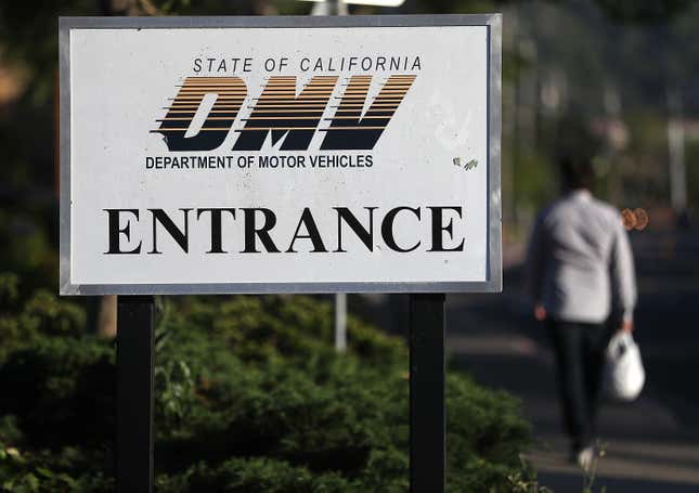 A sign is posted in front of a California Department of Motor Vehicles (DMV) office on May 9, 2017 in Corte Madera, California