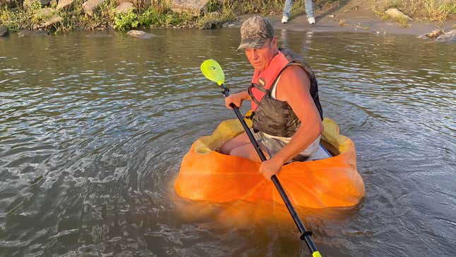 Image for article titled Nebraska Man Squashes Record With 38 Mile Paddle in a Pumpkin