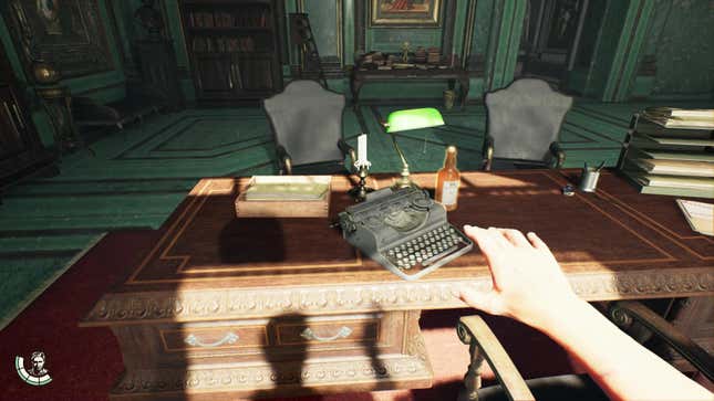 The player reaches for a desk with a typewriter on it.