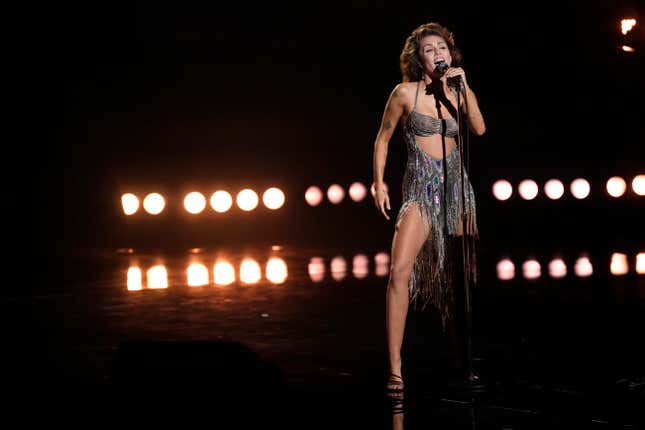 Miley Cyrus performs &quot;Flowers&quot; during the 66th annual Grammy Awards on Sunday, Feb. 4, 2024, in Los Angeles. (AP Photo/Chris Pizzello)