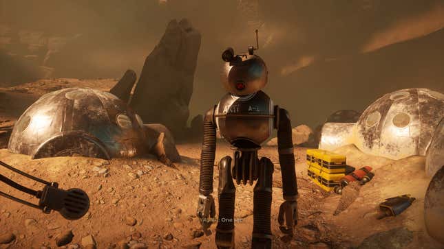 A broken robot stands lifeless in front of metallic orb tents on dusty ground.