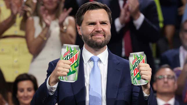 An image shows JD Vance holding two Mountain Dew cans. 