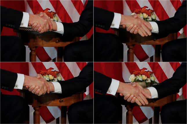 Image for article titled Trump’s handshake trick doesn’t seem to work on other people’s turf