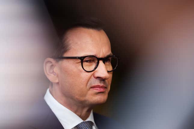 FILE - Poland&#39;s Prime Minister Mateusz Morawiecki talks to journalists as he arrives for the third EU-CELAC summit in Brussels, Belgium, Tuesday, July 18, 2023. Polish and U.S. officials signed an agreement Wednesday, Sept. 27, 2023 in Warsaw for the construction of Poland&#39;s first nuclear power plant, part of an effort by the Central European nation to move away from polluting fossil fuels. (AP Photo/Geert Vanden Wijngaert, File)