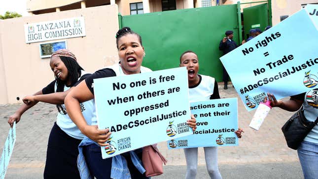 South African Members of the Lesbian, Gay, Bisexual, Transgender, Queer or Questioning and Intersex community (LGBTQI) protest outside the Tanzania High Commission on November 26, 2018 in Pretoria.