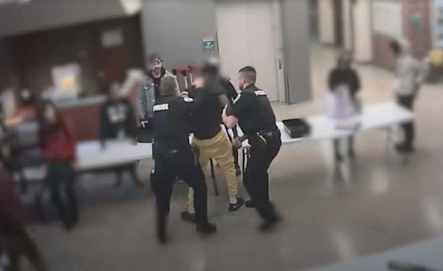 Image for article titled WATCH: Ohio High School Officer Punches Restrained Black Student in the Head Multiple Times. You Won&#39;t Believe What Triggered It