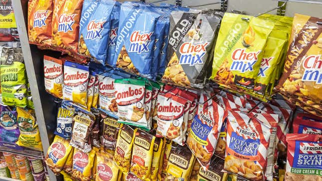 A photo of a display of snacks in an airport shop. 