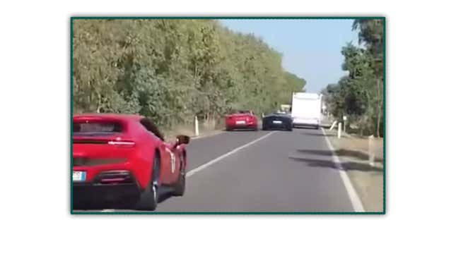 A screenshot showing a Lambroghini and Ferrari crashing with a campervan. 