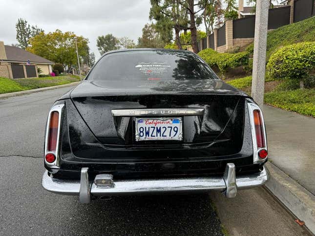 The rear of the Mitsuoka parked on a street