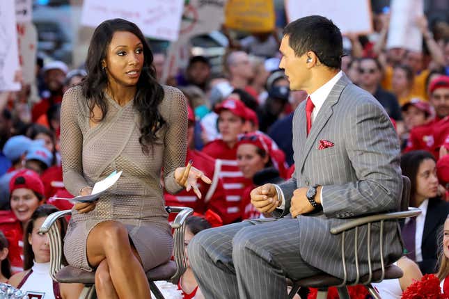 ESPN College Gameday Analysts Maria Taylor and David Pollack discuss college gameday at Times Square on September 23, 2017 in New York City. 