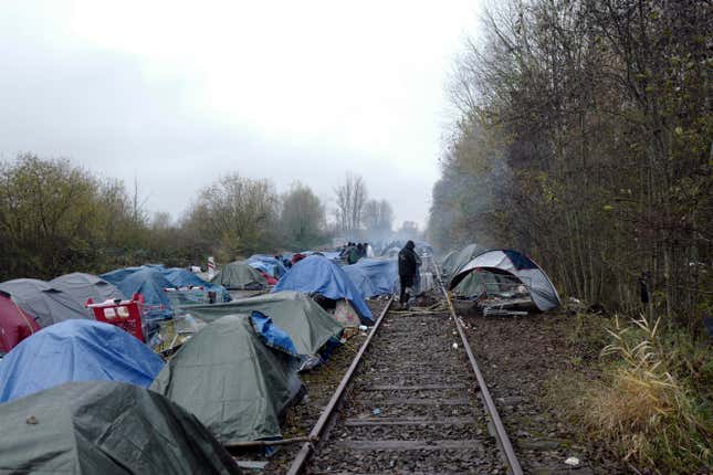 FILE - A migrants makeshift camp is set up in Calais, northern France, where migrants wait for the change to make a dash across the English Channel, on Saturday, Nov. 27, 2021. Britain and its former partners in the European Union have struck a deal to cooperate more on tackling illegal migration. (AP Photo/Rafael Yaghobzadeh, File)