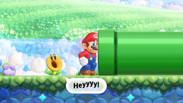 Uno screenshot mostra Mario che passa davanti a un fiore parlante. 