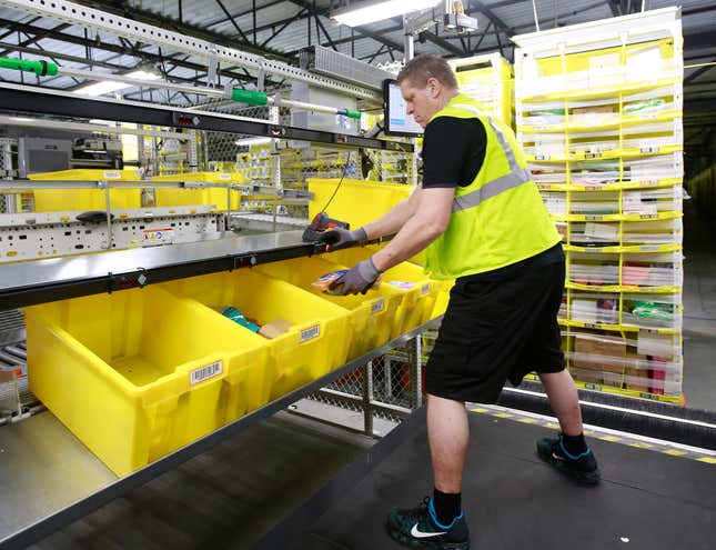 FILE - Merchandise is scanned to be tracked as it moves through the new Amazon Fulfillment Center in Sacramento, Calif., on Feb. 9, 2018. As global warming rises temperatures, a California labor protection board has approved standards, Thursday, March 21, 2024, that would require companies protect their employees from excessive heat even inside, particularly in warehouses. The rules still need final approval by the state&#39;s Occupational Safety and Health Administration. (AP Photo/Rich Pedroncelli, File)